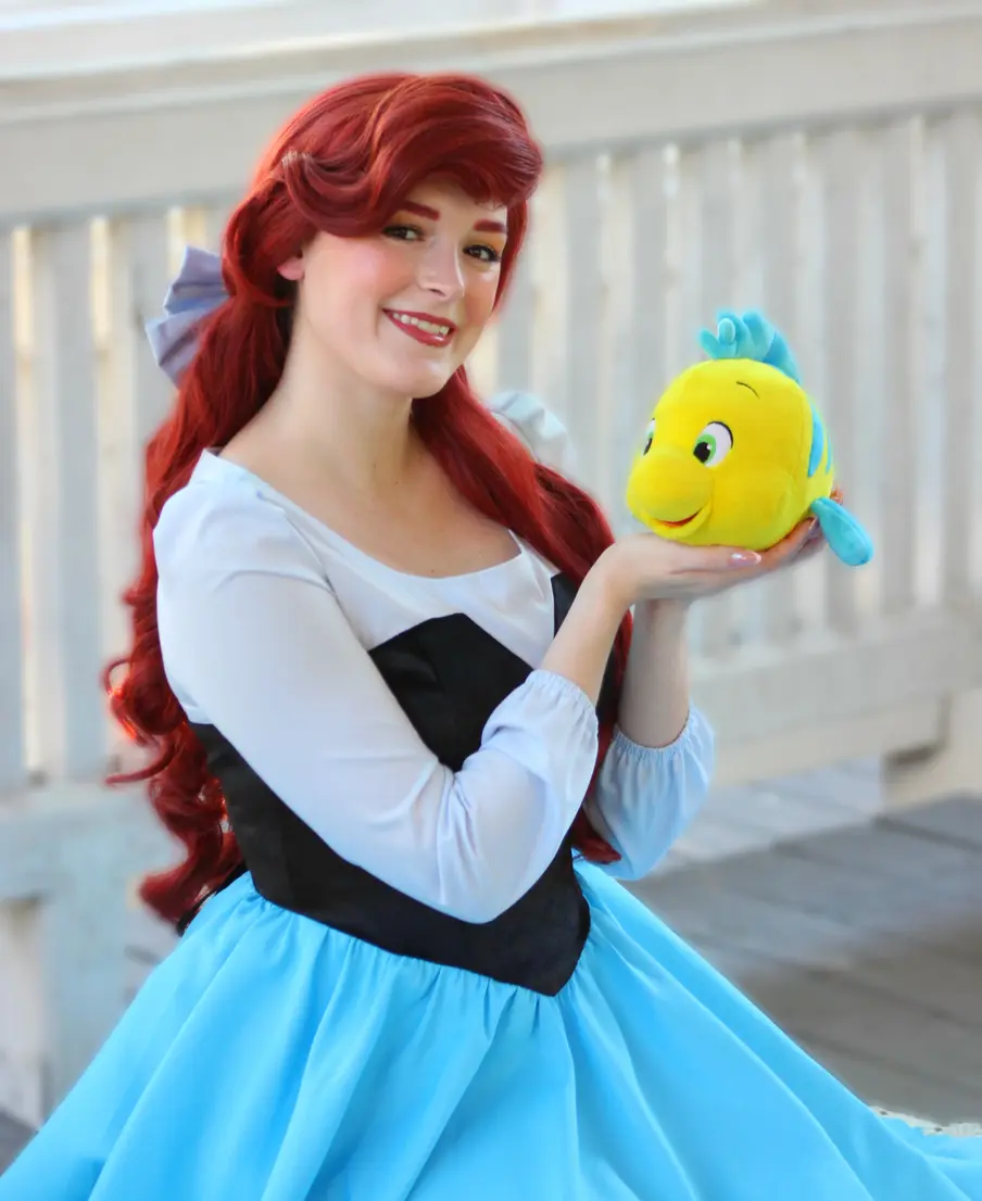 The Little Mermaid in her Kiss the Girl dress