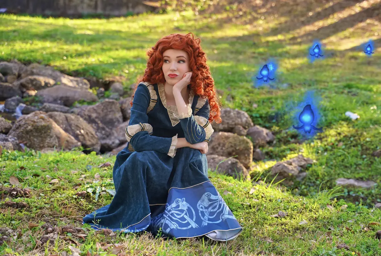 Scottish princess in a field with wil-o-the-wisps