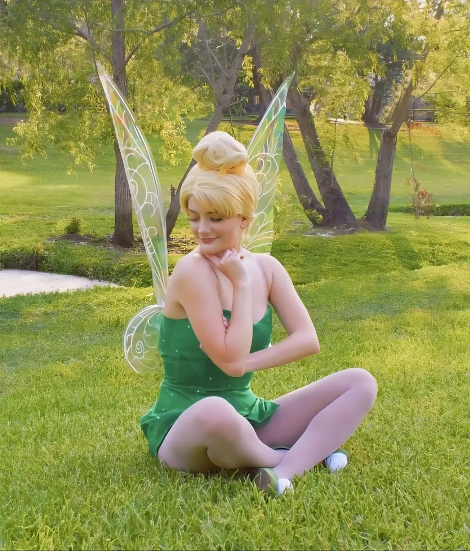 Tinker Bell in a field basking in the sun